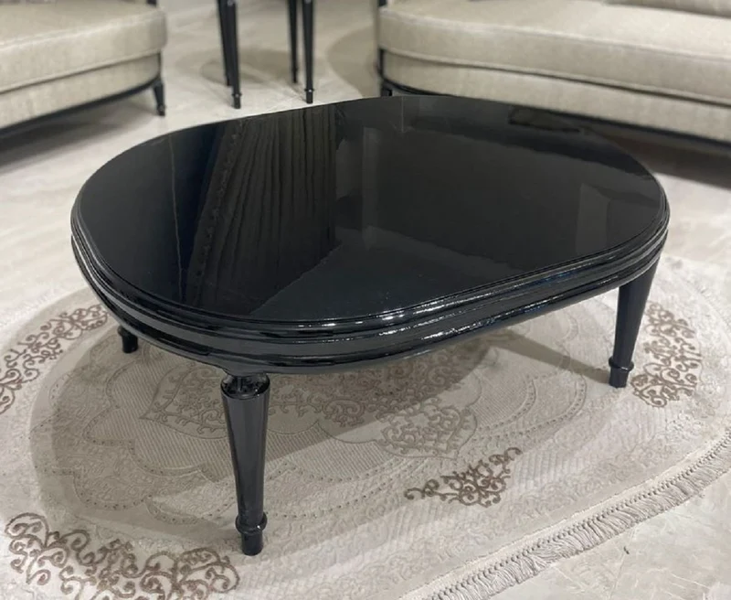 Casa Padrino Luxus Barock Couchtisch Schwarz - Ovaler Barockstil Wohnzimmertisch - Luxus Wohnzimmer Möbel im Barockstil - Barock Möbel - Edel & Prunkvoll