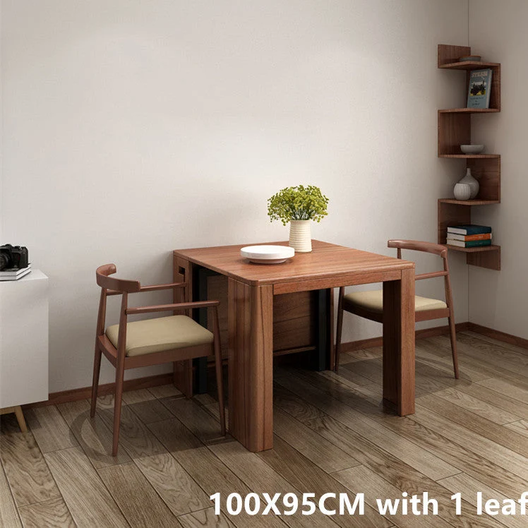 Platzsparender und ausziehbarer Tisch mit 4 Einlegeplatten