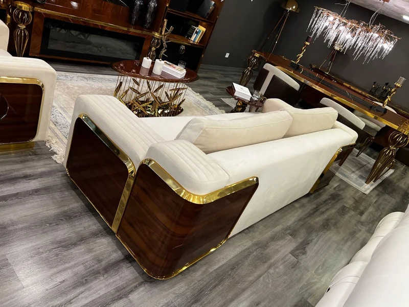 Casa Padrino Luxus Couchtisch Braun / Gold 120 x 51 x H. 47 cm - Ovaler Edelstahl Wohnzimmertisch mit Massivholz Tischplatte - Wohnzimmer Möbel - Hotel Möbel - Luxus Möbel