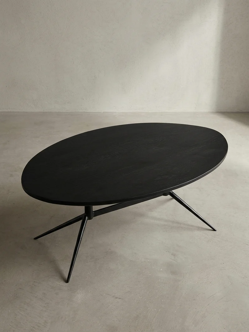 Couchtisch Oval in Schwarz aus Mango Massivholz und Metall, 90x50x35 cm mit natürlicher Holzmaserung