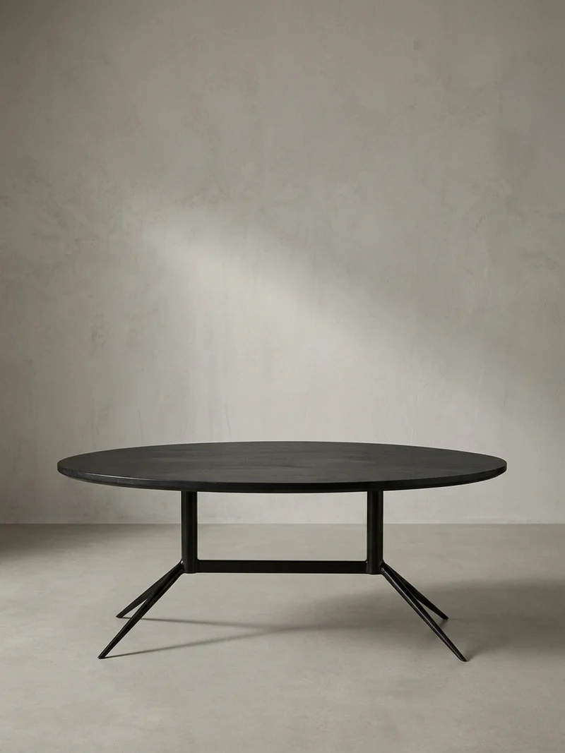 Couchtisch Oval in Schwarz aus Mango Massivholz und Metall, 90x50x35 cm mit natürlicher Holzmaserung