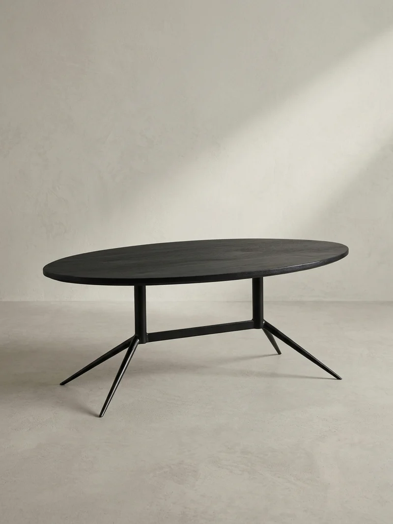 Couchtisch Oval in Schwarz aus Mango Massivholz und Metall, 90x50x35 cm mit natürlicher Holzmaserung