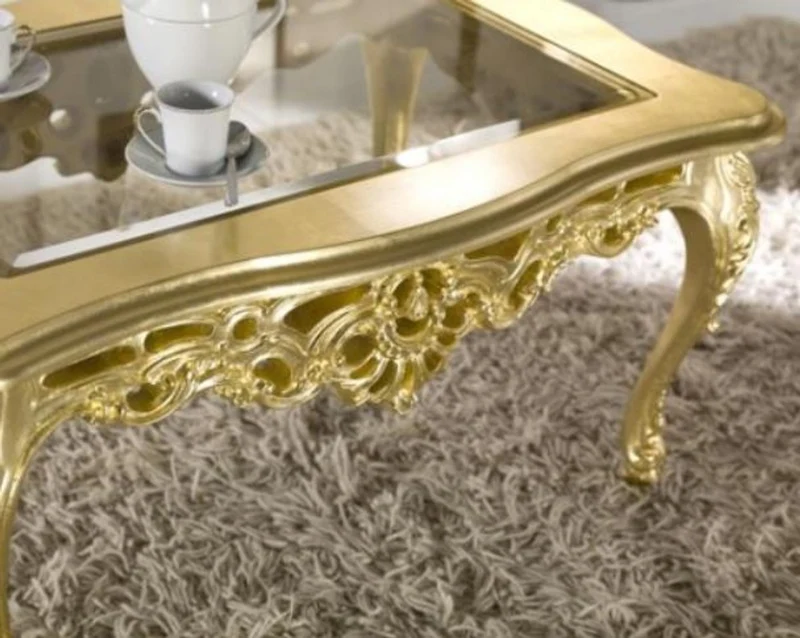 Casa Padrino Luxus Barock Couchtisch Gold 84 x 44 x H. 57 cm - Prunkvoller Wohnzimmertisch mit Glasplatte - Barock Wohnzimmer Möbel - Luxus Qualität - Made in Italy