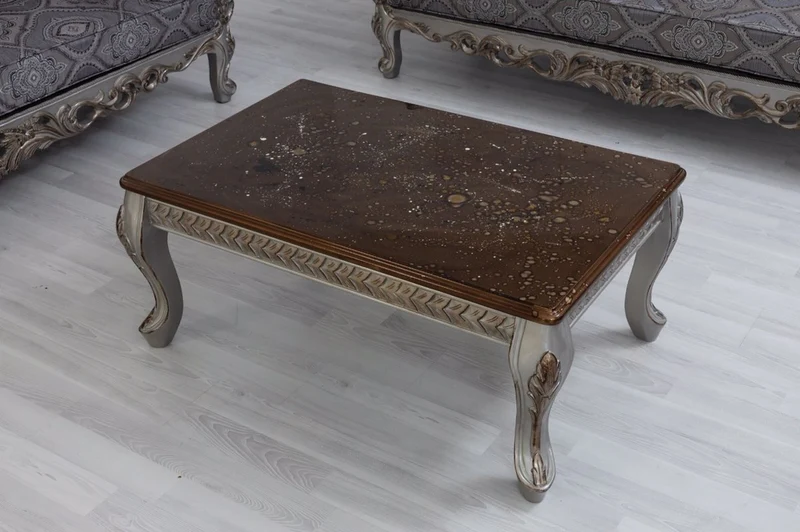 Casa Padrino Luxus Barock Couchtisch Braun / Silber / Bronze 115 x 77 x H. 48 cm - Massivholz Wohnzimmertisch - Wohnzimmer Möbel im Barockstil