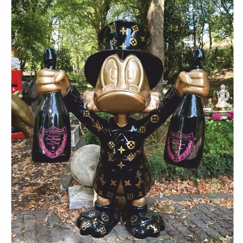 Casa Padrino XXL Deko Skulptur Ente Schwarz / Gold H. 170 cm - XXL Deko Figur - Garten Skulptur - Garten Figur