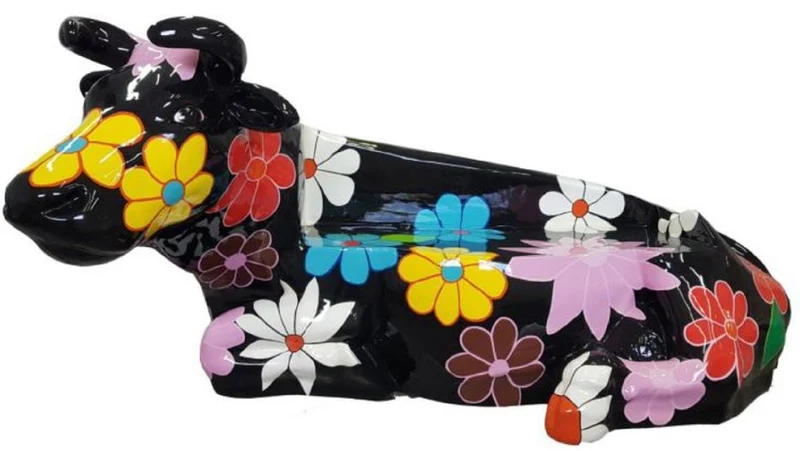 Casa Padrino Designer Sitzbank Kuh mit Blumen Design Schwarz / Mehrfarbig 200 x H. 98 cm - Wetterbeständige Kuh Skulptur Gartenbank - Garten & Terrassen Deko Accessoires