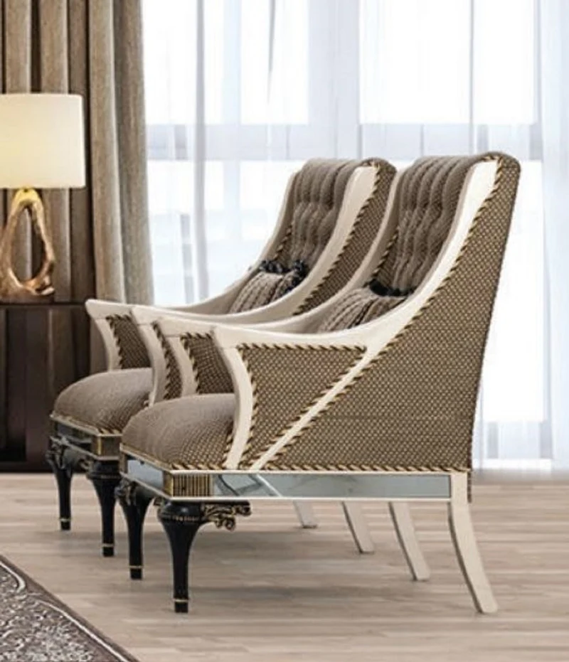 Casa Padrino Luxus Barock Sessel Braun / Weiß / Schwarz / Gold - Prunkvoller Wohnzimmer Sessel mit dekorativem Kissen - Barock Wohnzimmer Möbel