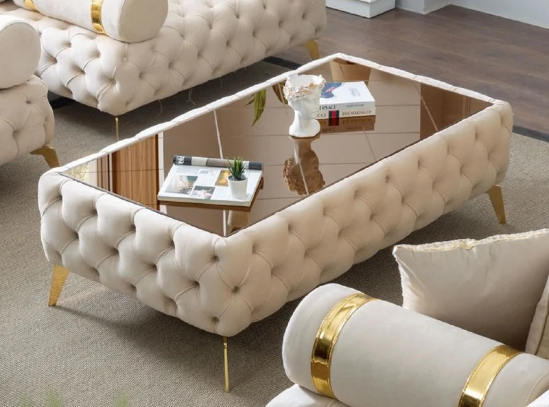 Casa Padrino Luxus Chesterfield Couchtisch Creme / Gold / Braun 140 x 80 x H. 45 cm - Wohnzimmertisch mit Glasplatte - Wohnzimmer Möbel - Chesterfield Möbel - Luxus Möbel - Luxus Einrichtung