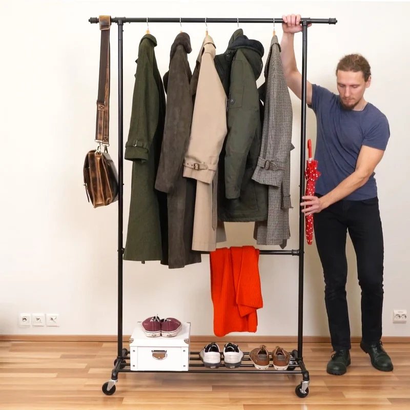 Tatkraft Drago – Stabiler Schwerlast-Kleiderständer auf Rollen, 2 Kleiderstangen, Ablage, bis 110 kg, 130 × 49 × 198 cm, pulverbeschichteter Stahl, Schwarz