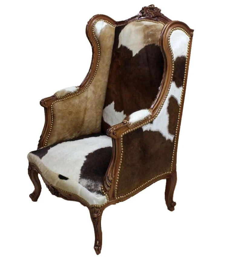 Casa Padrino Barock Lounge Thron Sessel mit Kuhfell, Ohrensessel im Antik Stil, Naturholzfarbig, 120 x 83 x 64 cm