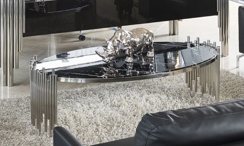 Casa Padrino Luxus Couchtisch mit Kunstmarmor Tischplatte Schwarz / Silber 140 cm - Luxus Möbel