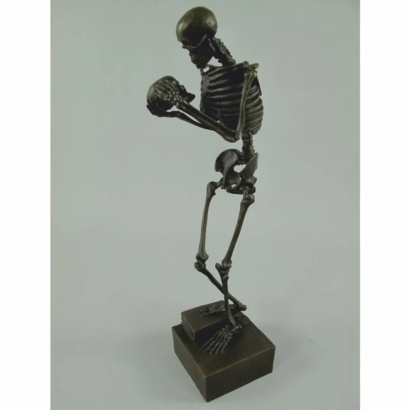 Casa Padrino Bronze Deko Skulptur Skelett H. 31 cm - Deko Accessoires
