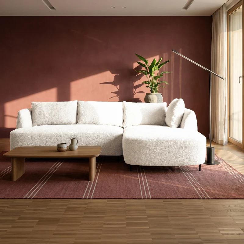 Modulares Ecksofa Lanomi, L-förmig, rechtsseitig, cremefarbenes Bouclé