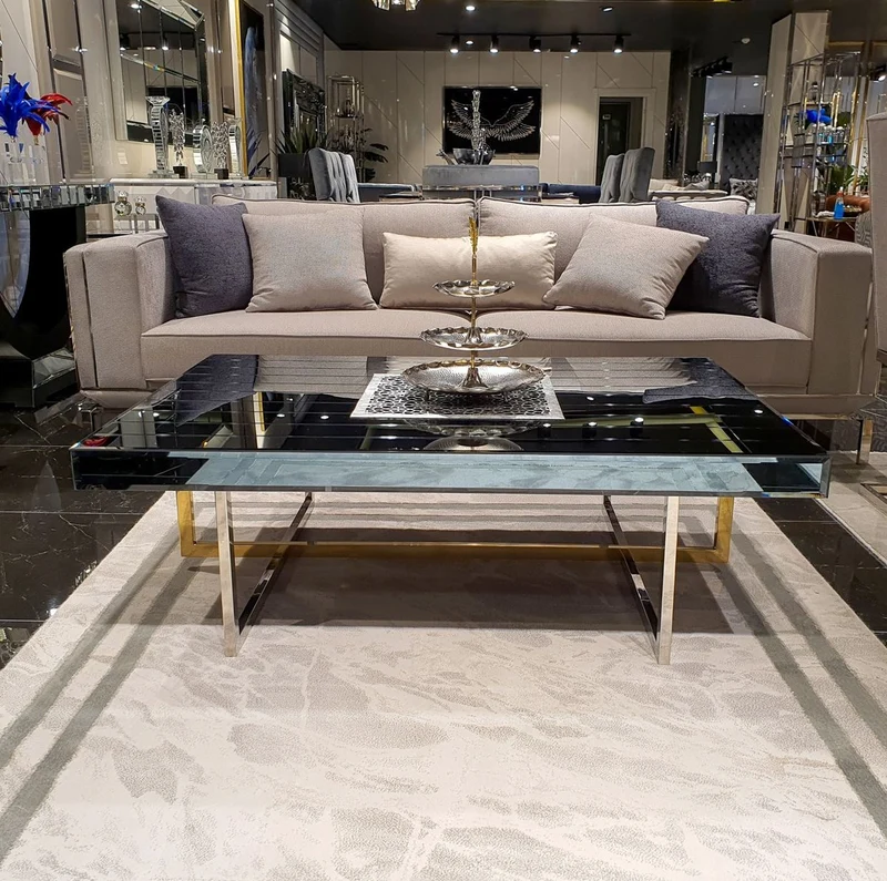 Casa Padrino Luxus Couchtisch Silber / Gold 120 x 60 x H. 43 cm - Verspiegelter Wohnzimmertisch - Verspiegelte Luxus Wohnzimmer Möbel
