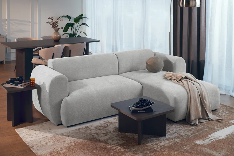 Ecksofa mit Schlaffunktion Emia, L-förmig, rechtsseitig, hellgrauer Chenille-Stoff