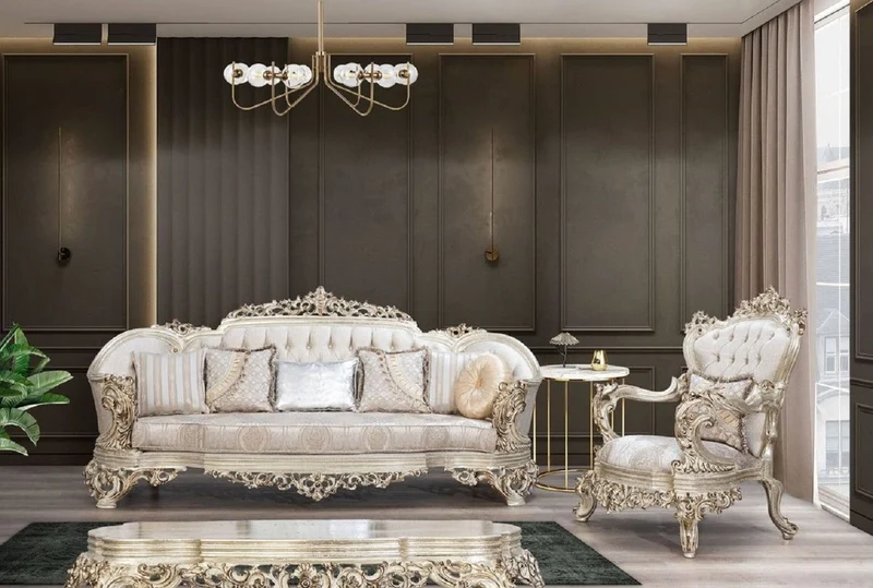 Casa Padrino Luxus Barock Sofa Cremefarben / Beige / Antik Gold - Prunkvolles Wohnzimmer Sofa mit elegantem Muster - Barock Wohnzimmer Möbel