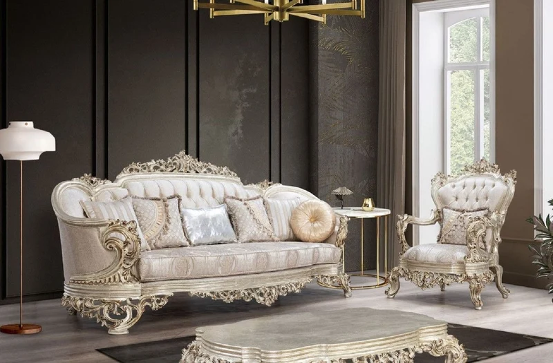 Casa Padrino Luxus Barock Sofa Cremefarben / Beige / Antik Gold - Prunkvolles Wohnzimmer Sofa mit elegantem Muster - Barock Wohnzimmer Möbel
