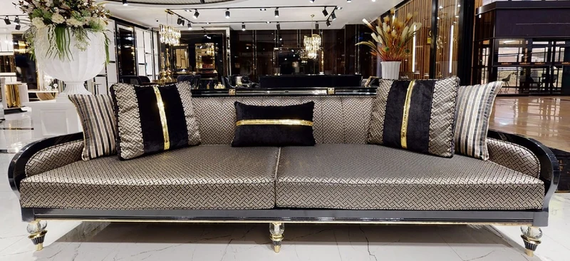Casa Padrino Luxus Art Deco Sofa Gold / Cremefarben / Schwarz / Gold - Art Deco Wohnzimmer & Hotel Möbel - Luxus Kollektion