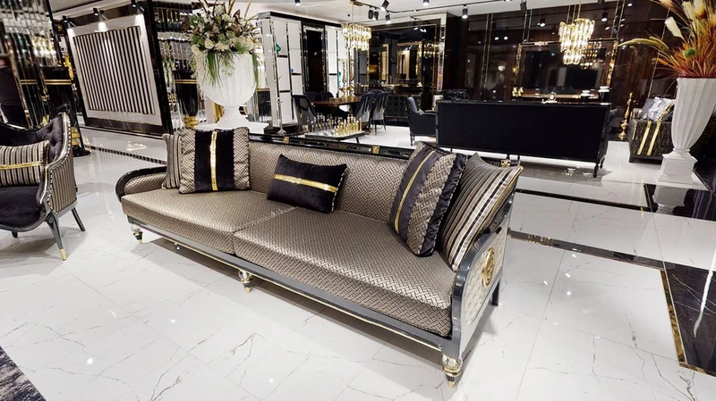 Casa Padrino Luxus Art Deco Sofa Gold / Cremefarben / Schwarz / Gold - Art Deco Wohnzimmer & Hotel Möbel - Luxus Kollektion