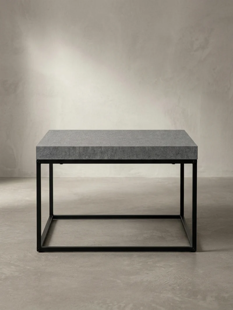 Couchtisch in Stein-Optik mit Metallbeinen im modernen Design