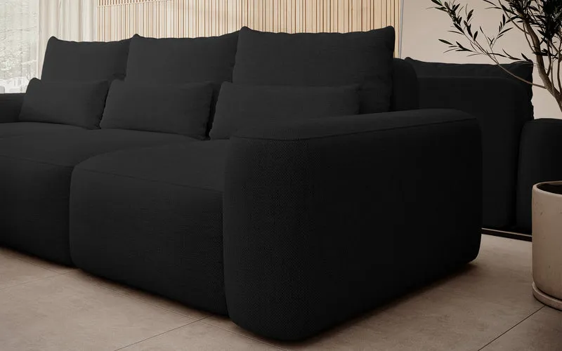Ecksofa mit Schlafunktion Carnos, L-förmig, mit zusätzlichen Lendenkissen, schwarzer hydrophober Chenille, linksseitig