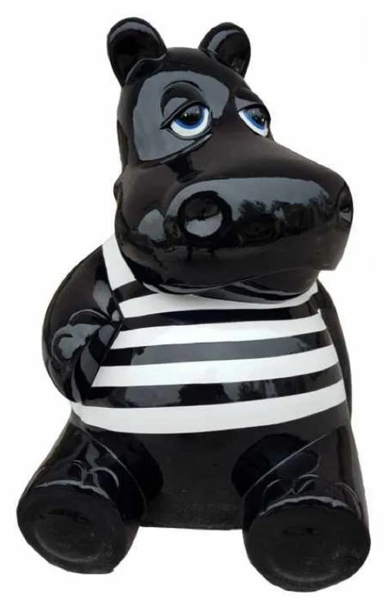 Casa Padrino Designer Deko Skulptur Sitzendes Nilpferd Schwarz / Weiß H. 48 cm - Wetterbeständige Dekofigur - Wohnzimmer Deko - Garten Deko - Terrassen Deko