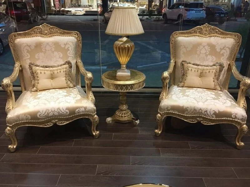 Casa Padrino Luxus Barock Sessel Gold / Antik Gold - Prunkvoller Wohnzimmer Sessel mit elegantem Muster - Barock Wohnzimmer Möbel