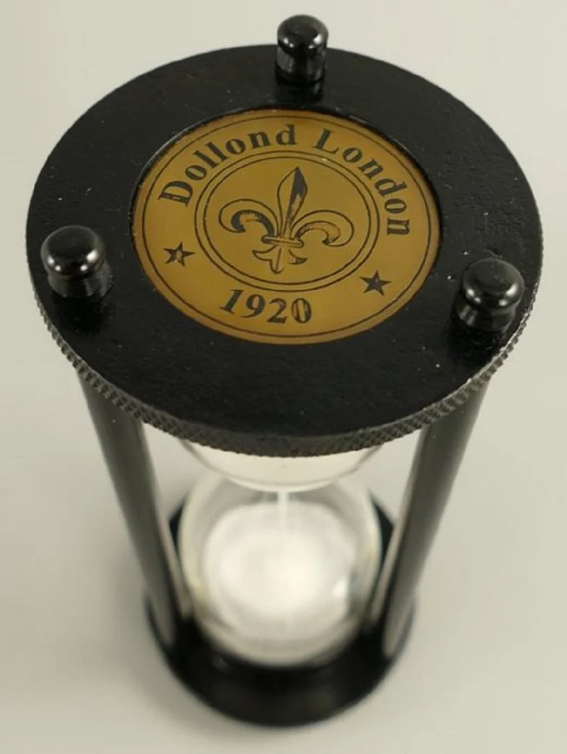 Casa Padrino Deko Sanduhr Schwarz / Weiß Ø 7 x H. 18 cm - Schreibtisch Deko - Wohnzimmer Deko - Designer Deko - Deko Accessoires