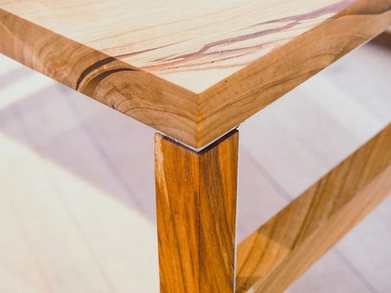 Katrin - Epoxidharz Couchtisch aus Kirsche mit Kupfer Harz