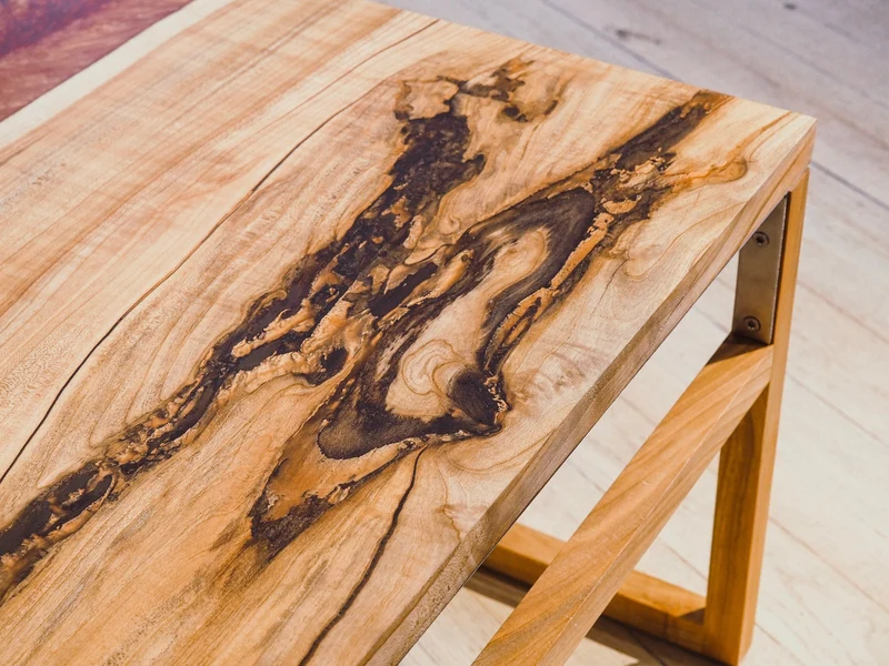 Katrin - Epoxidharz Couchtisch aus Kirsche mit Kupfer Harz
