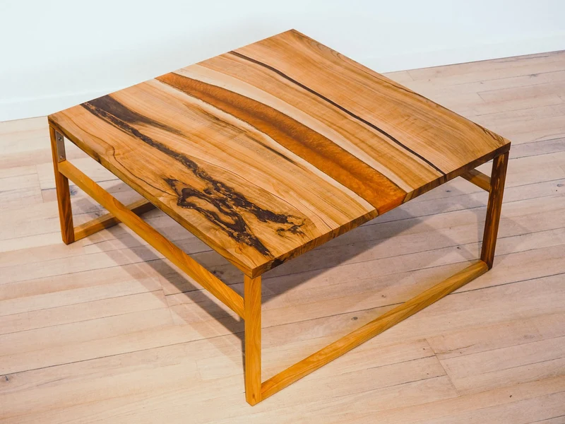 Katrin - Epoxidharz Couchtisch aus Kirsche mit Kupfer Harz