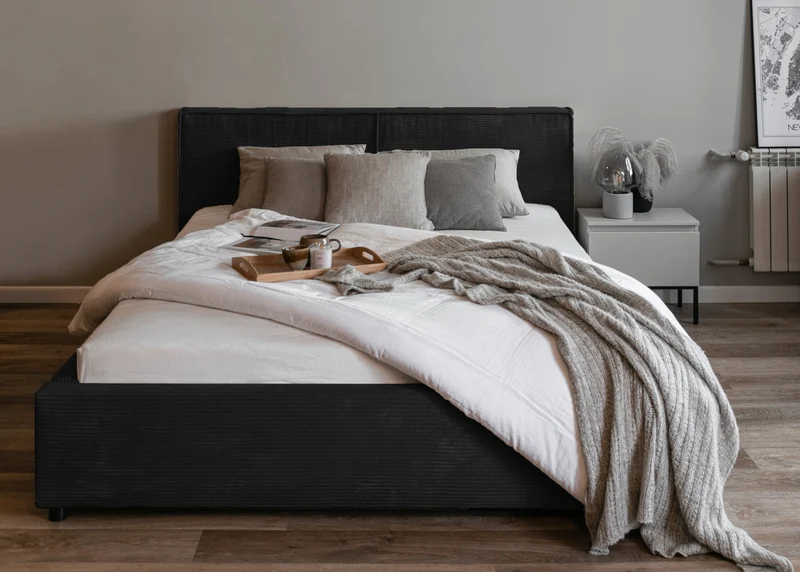 Gepolstertes Bett 160x200 cm Farese mit Stauraum und Gasdruckfeder, schwarz Cord