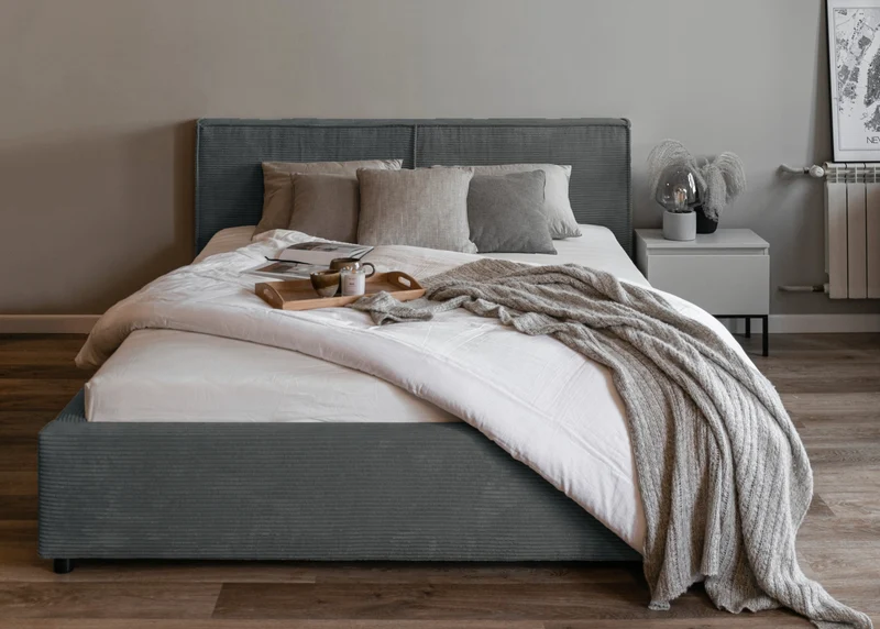 Gepolstertes Bett 180x200 cm Farese mit Stauraum und Gasdruckfeder, grau Cord