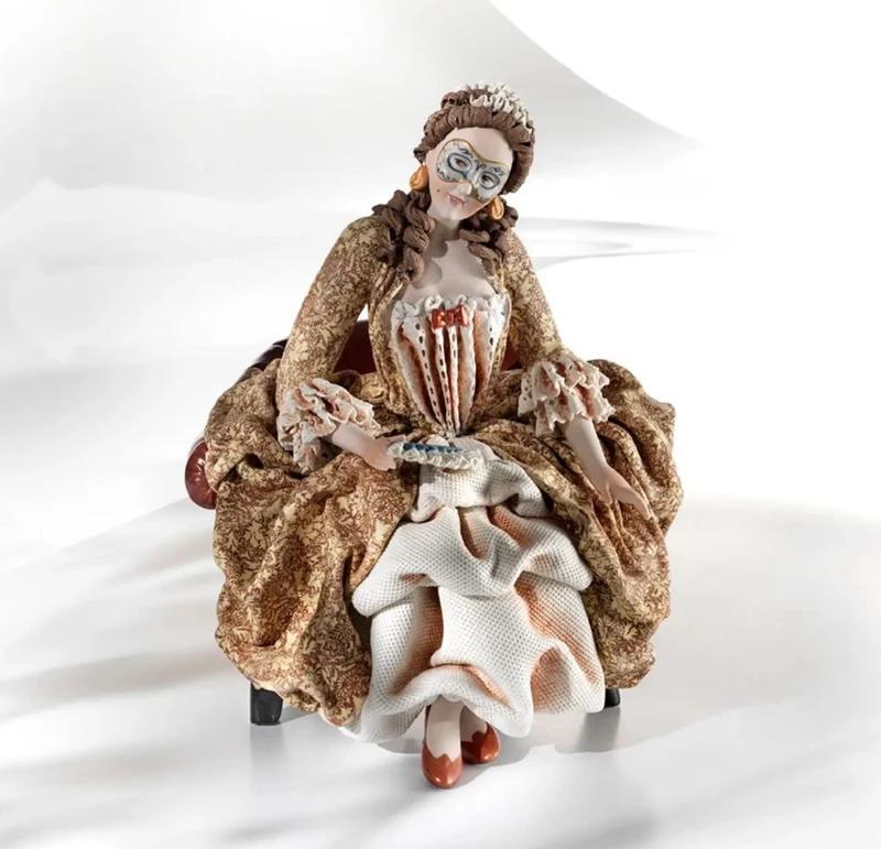 Casa Padrino Barock Porzellan Deko Puppe Dame auf Sessel Bunt H. 33 cm - Made in Italy