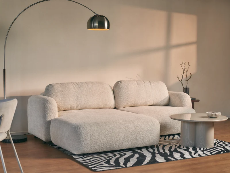 Ecksofa mit Schlaffunktion Tvoya, L-förmig, linksseitig, hellbeige Bouclé