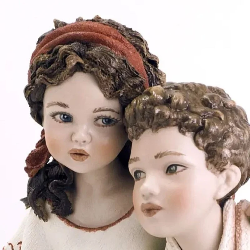 Casa Padrino Porzellan Deko Puppen Skulptur Junge & Mädchen H. 22,5 cm - Made in Italy