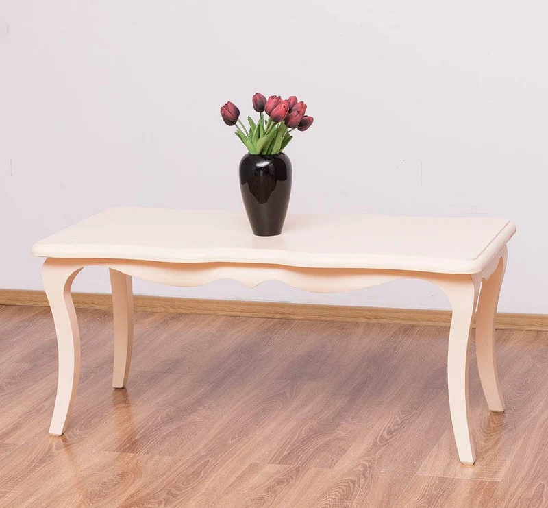 Kleiner Couchtisch im geschwungenen Stil | Beistelltisch aus Massivholz