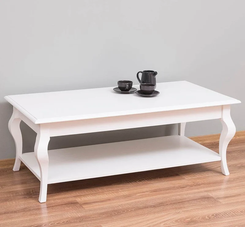 Couchtisch aus Massivholz mit geschwungenen Beinen