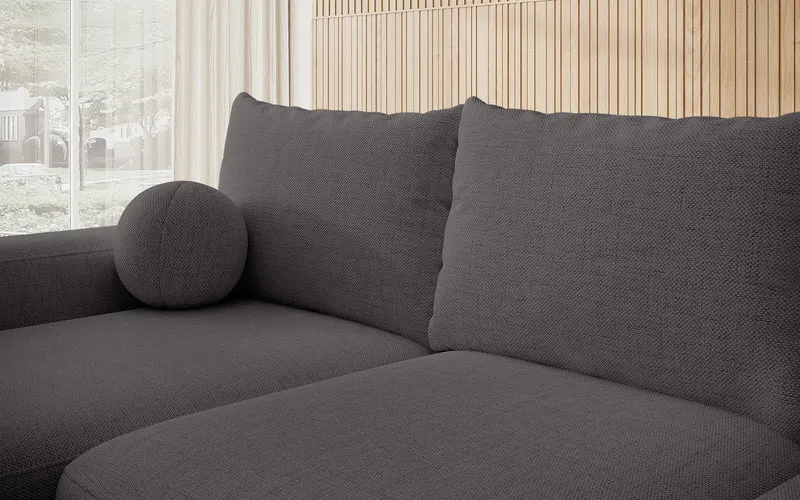 Ecksofa mit Schlaffunktion Carnos, L-förmig mit Ball, einzelne Kissen, dunkelgrauer hydrophober Chenille, linksseitig