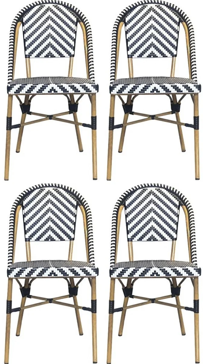 Casa Padrino Luxus Esszimmer Stuhl 4er Set Weiß / Schwarz / Beige 49 x 46 x H. 91 cm - Luxus Rattan Garten Stühle - Esszimmer Möbel - Garten Möbel - Rattan Möbel - Luxus Möbel