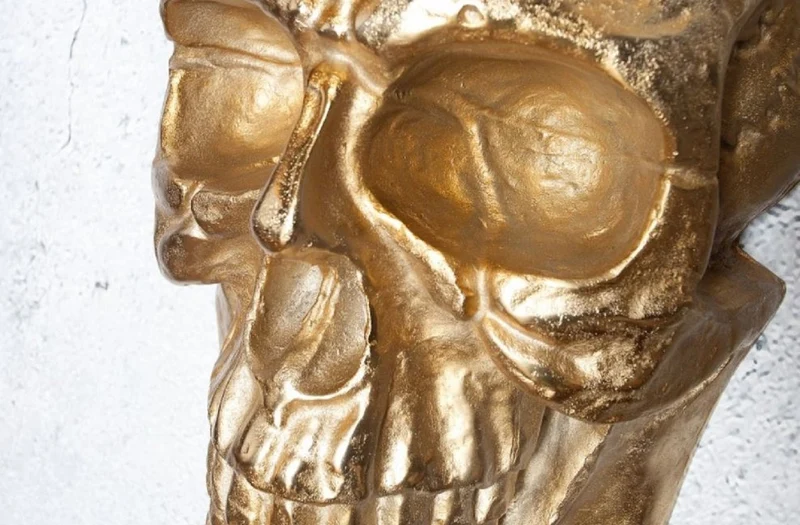 Casa Padrino Designer Metall Wanddeko Skulptur Totenkopf Gold 30 x 20 x H. 40 cm - Metall Wanddeko Figur Skull