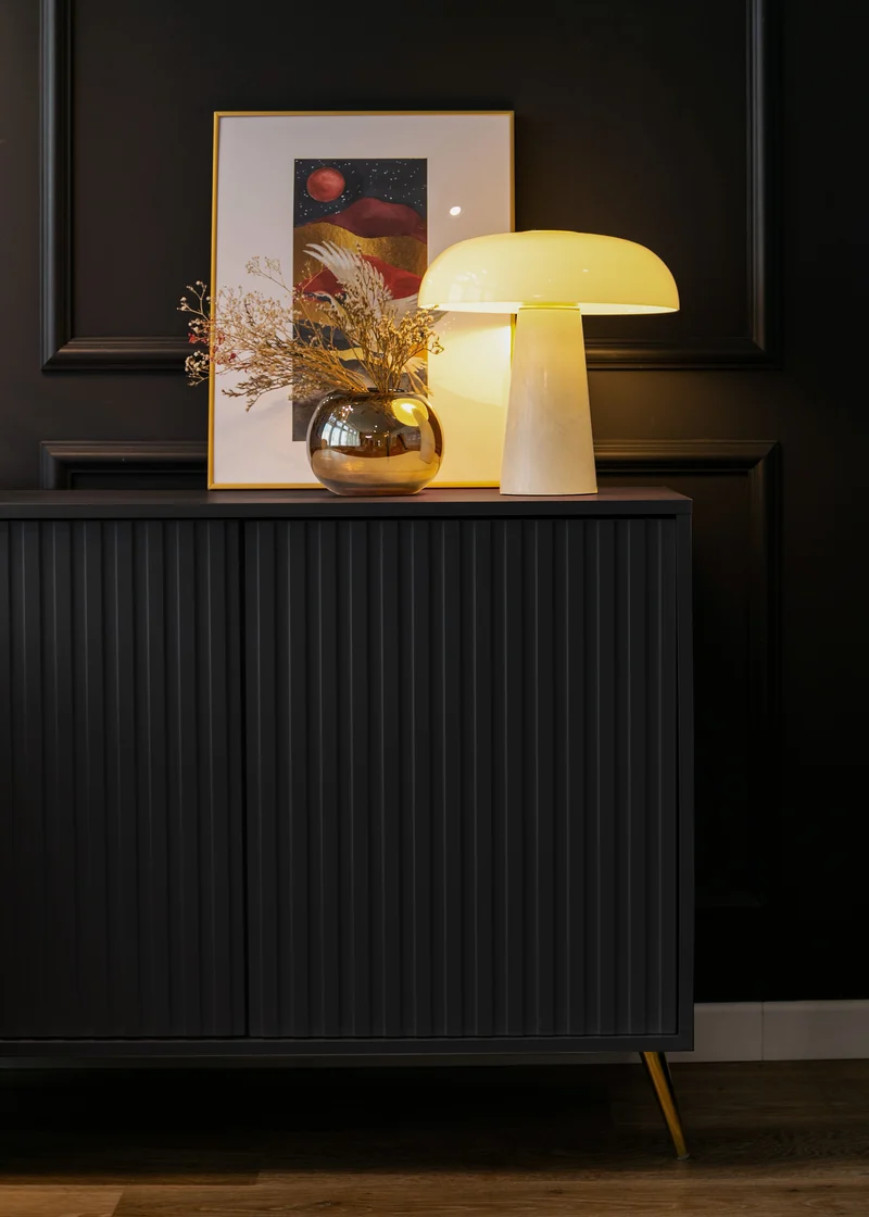 Kommode Bello mit Lamellenfronten 104 cm schwarz mit goldenen Beinen