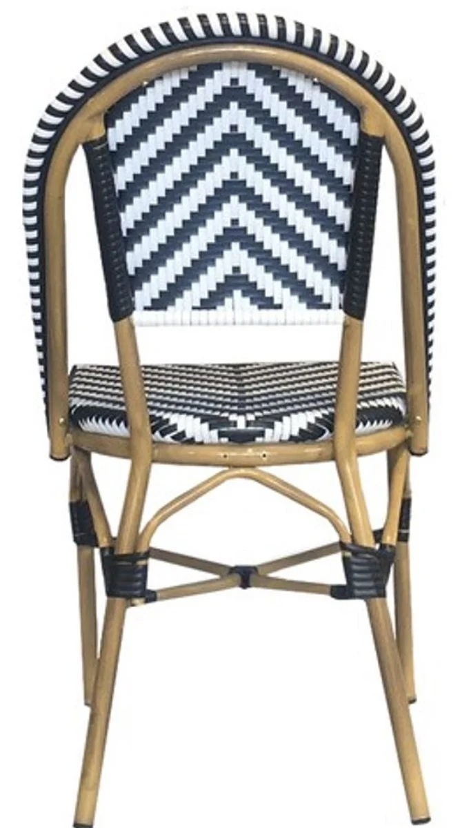Casa Padrino Luxus Esszimmer Stuhl Weiß / Schwarz / Beige 49 x 46 x H. 91 cm - Luxus Rattan Garten Stuhl - Esszimmer Möbel - Garten Möbel - Rattan Möbel - Luxus Möbel